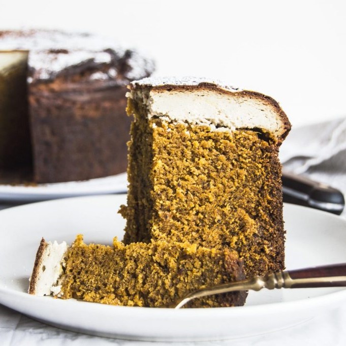 Vegan Pumpkin Zesty Orange And Crushed Black Pepper Cake With Cardamom Cheesecake Topping